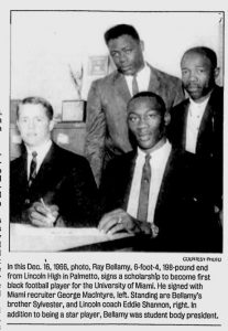 I was happy to find the picture of this historic moment in the February 1, 2002 issue of The Herald Tribune.